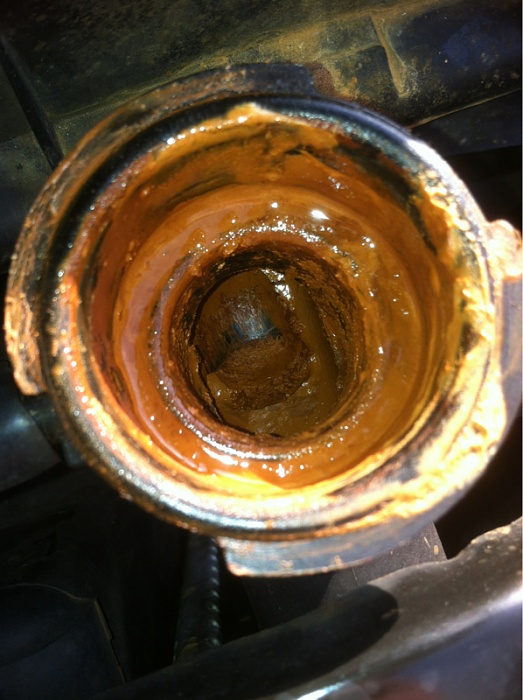 Orange/brown sludge under radiator cap-image-3954712586.jpg