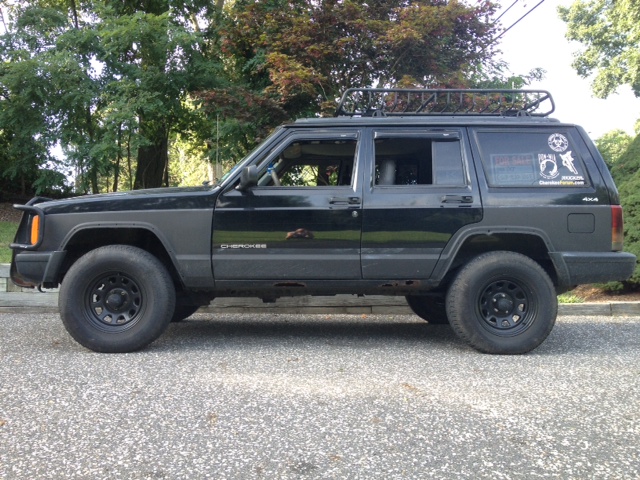 31&quot; tires on stock suspension. with trimming.-photo-3-.jpg