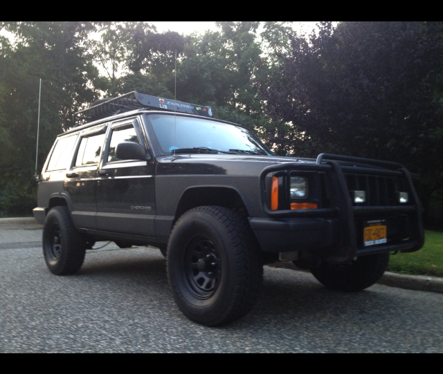 31&quot; tires on stock suspension. with trimming.-nancy.jpg