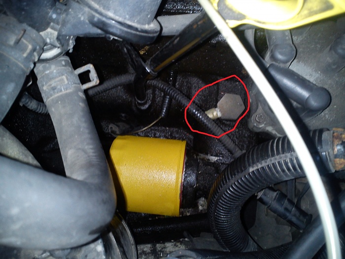 Looked at my Oil Pressure Sending Unit, and found a mystery-unplugged-sending-unit.jpg