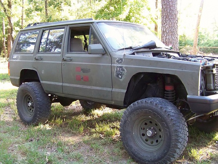 Does anyone know where i can get some cheep fender flares-100_2459-12.jpg