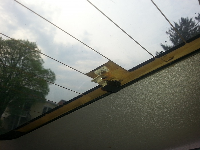 The rear defroster connection is separated at the glass. How do I fix that?-defroster-thing.jpg