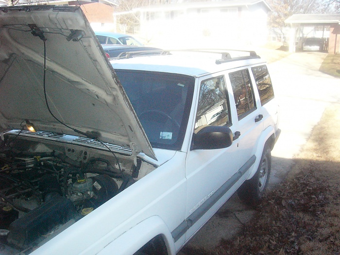 Looking to get this Jeep Cherokee-left-side.jpg