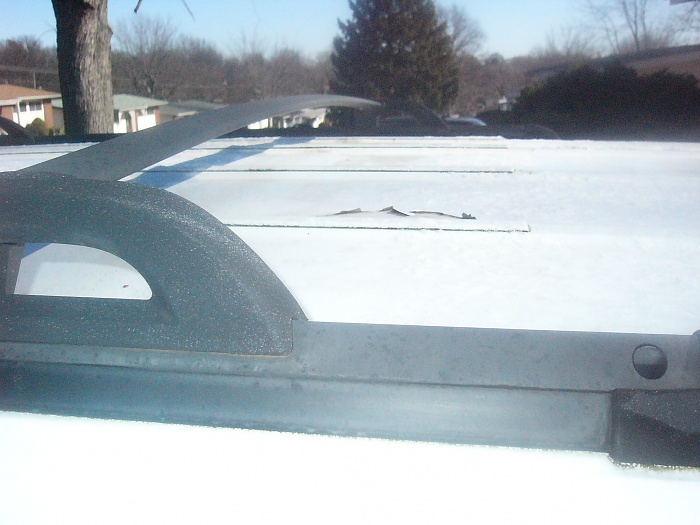 Looking to get this Jeep Cherokee-roof-damage.jpg