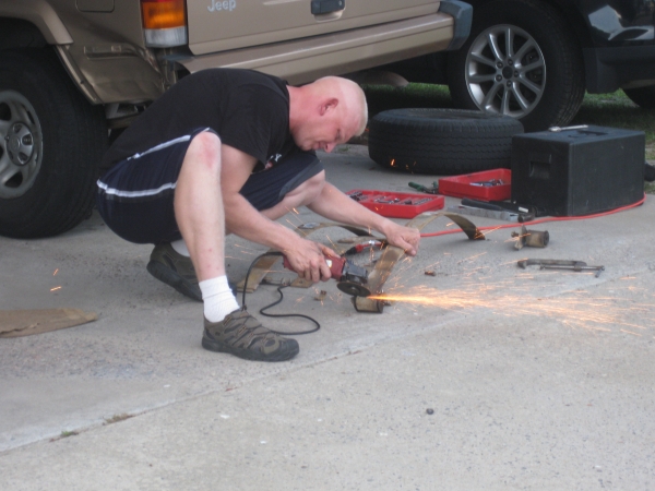 My 99 (nothing crazy)-grinding-leaf-spring.jpg