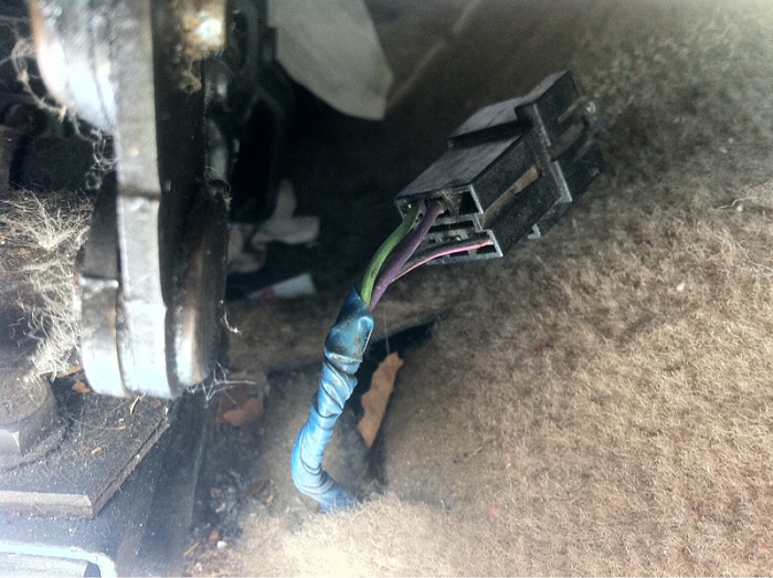 Plug under passenger side seat-image-4209597478.jpg
