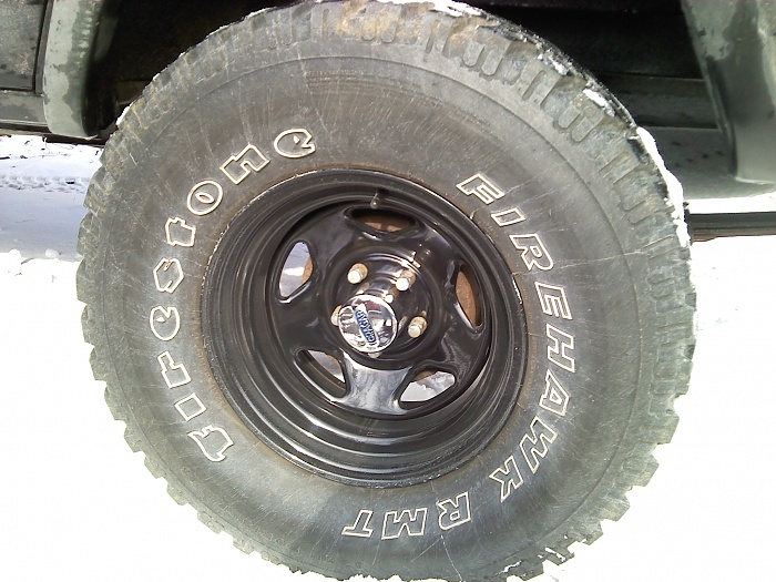 Looking for a pic of 32's on a 15x10 rim with 4 inch backspacing-p260113_11.50_.jpg