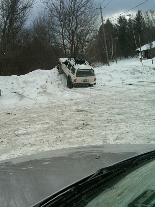 What did you do to your Cherokee today?-jeep-snow-bank.jpg