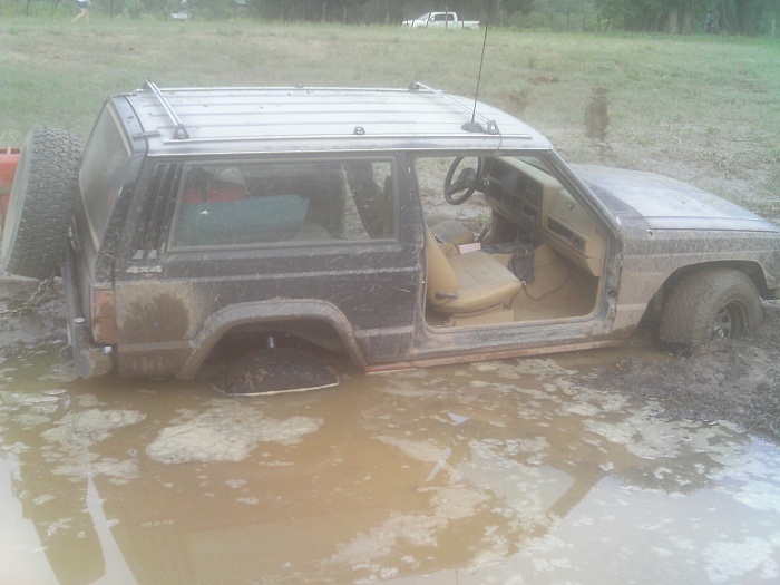 post the favorite picture of your jeep.-mud-pit-bad.jpg