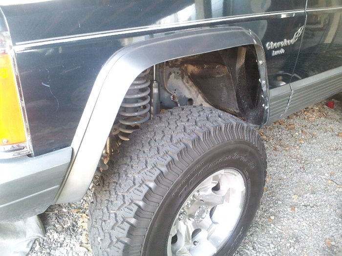 Has anyone ever thought of trimming stock fenders?-forumrunner_20111020_112126.jpg