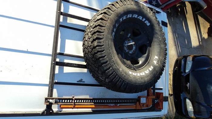Anyone build a spare tire carrier for their roofrack?-183426_1890621631803_1429377033_2174440_2542548_n.jpg