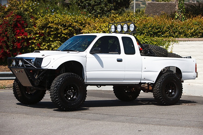 15x7 wheels w/ 35x12.50 tire?-tacoma-side3.jpg