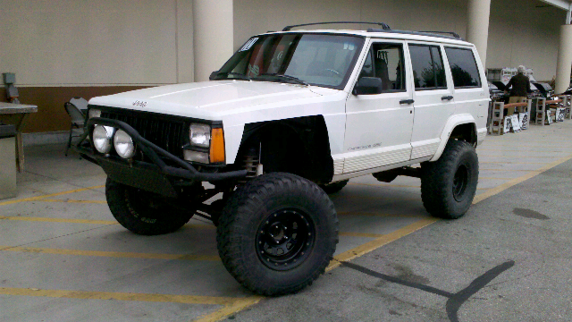6.5&quot; lift with 33's and 35's please post pic's-forumrunner_20110820_162545.jpg
